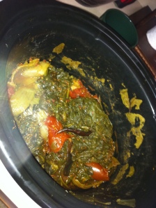 Cooking palak paneer in a slow cooker.